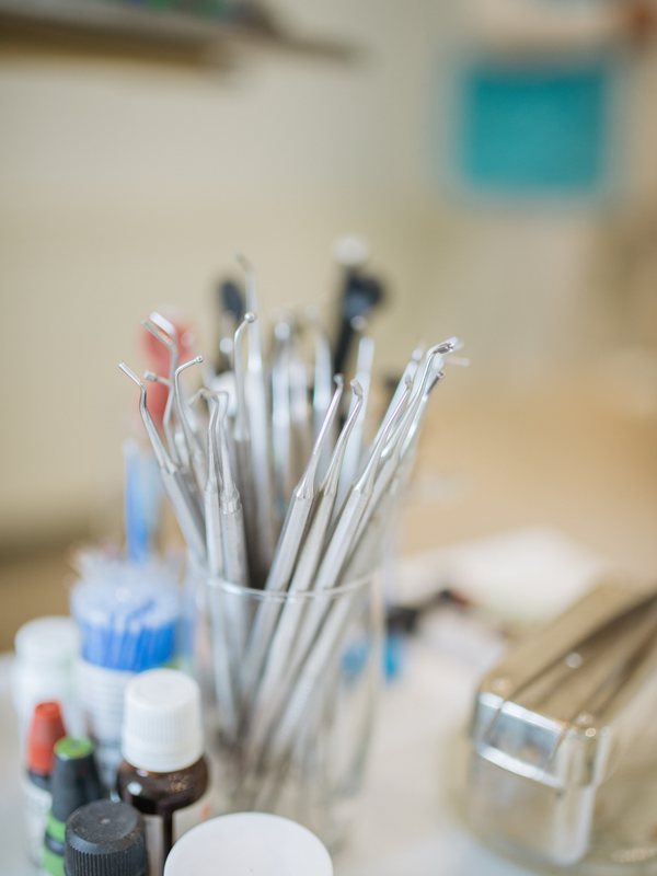 Hygiene instruments in a glass on the worktop