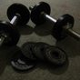 Dumbbells and weight plates in the clinic gym