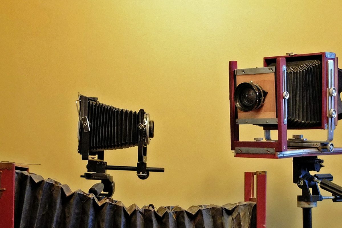 Wooden field cameras with bellows set up in the studio