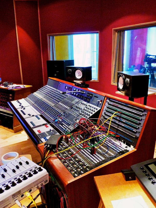 Vintage console with its patch bay and coloured patch cables in the jackfield