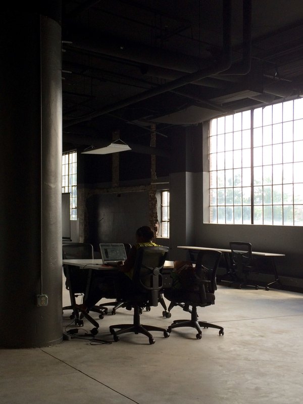 A member working alone at a quiet desk