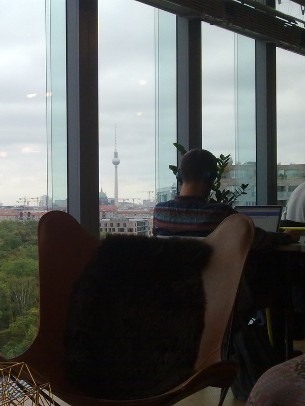 A member working at a window-side desk